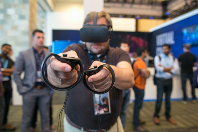 Uwe Erpel plays the virtual reality game Dead & Buried at the 2016 Intel Developer Forum in San Francisco on Tuesday, Aug. 16, 2016. (Credit: Intel Corporation)