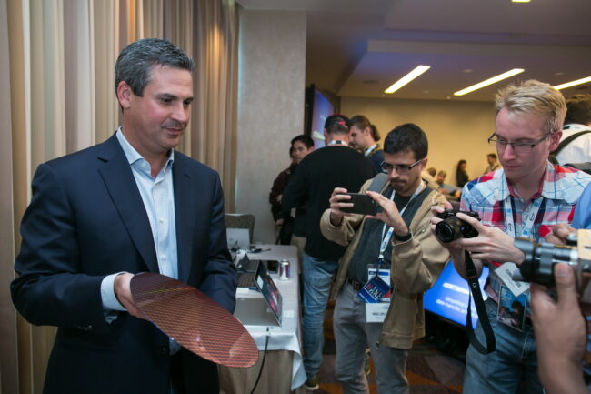 Chris Walker, Intel vice president for its Client Computing Group and general manager of notebook product marketing, displays a 7th Gen Intel Core processor silicon wafer. 7th Gen Intel Core processors deliver richer experiences, incredible performance and responsiveness, and true ultra HD 4K entertainment in stunning new devices. (Credit: Intel Corporation)